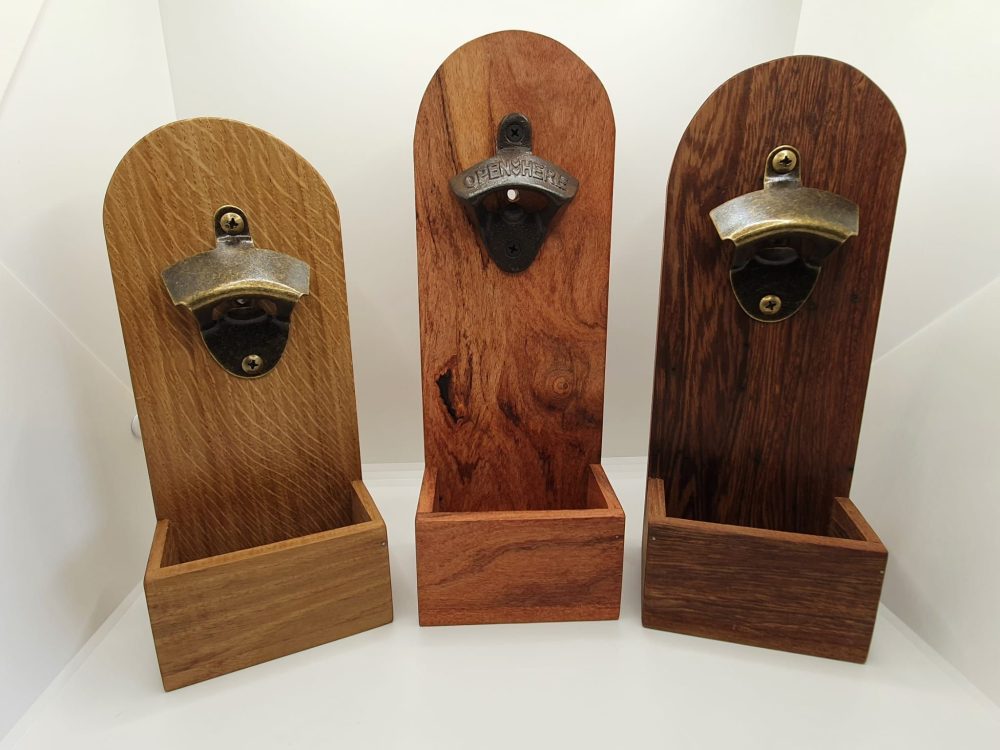 Wall mounted bottle opener with cap collection